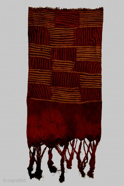 Africa,Ivory Coast, Dida tribe woman's tubular ceremonial garment of rafia fiber, 14 x 42 inches (each side), condition: overall some small holes, losses at the bottom edge on one side. Dida textiles  ...