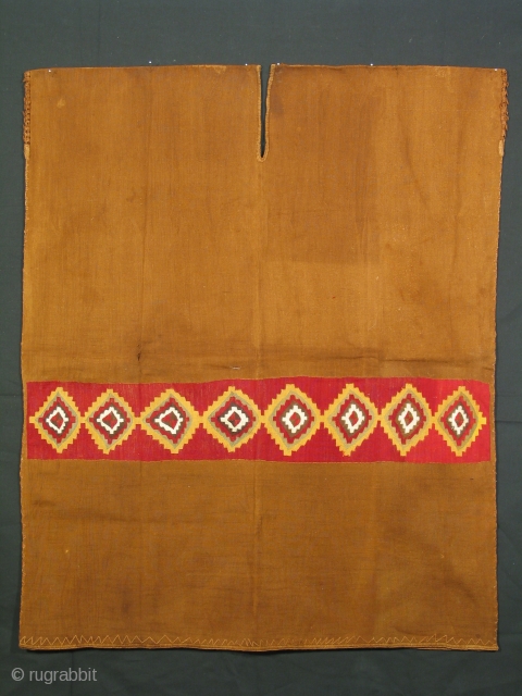 Man's tunic, Inca culture, Peru, 15th century, natural brown cotton with dyed alpaca patterning; complete, each side is 32 x 38 inches.           