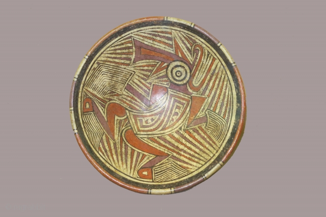 Panama, ceramic pedestal plate, Cocle culture, circa 800-1200 AD diameter 10 inches, foot 4 inches, depicting a shaman in transformation. One break and repair,         