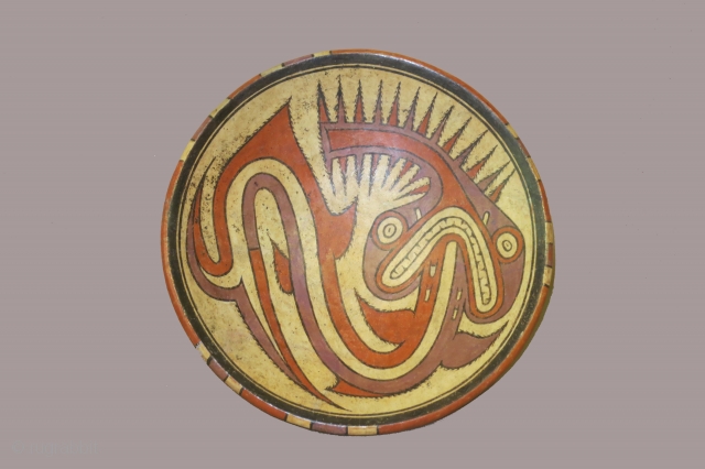 Panama, ceramic pedestal plate, Cocle culture, circa 800-1200AD, diameter 10 1/2 inches, foot 4 inches, depicting a sawfish-like creature/diety. Found broken in several pieces and restored ( no modern added pieces)  