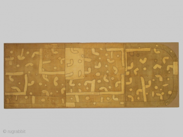Kuba kingdom, royal woman's long underskirt (fragment) Democratic Republic of Congo, rafia fiber, patterned by applique patches, circa 1890-1920, mounted, 30 x 85 inches. In excellent condition.      