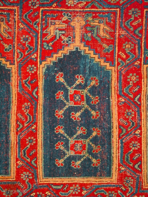 Ushak carpet fragment from a large mosque prayer carpet with three rows of three niches, late 18th century, 400-245cm, overall even pile; one small hole has been repaired. Compared to other Ushak  ...