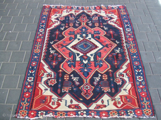 north-west Iranian Kurdish 'Senneh' kilim
size:150x115-cm / 59.0x45.2-inches condition:There is a hole in the carpet                   