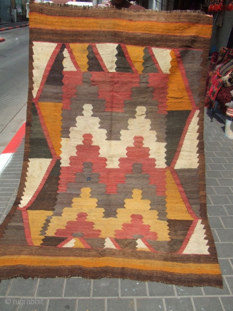 Afghan kilim made with wool on wool .
The kilim enjoyed beautiful colors and patterns The kilim has been fixed in some places(as you can see on the pictures)Condition: good (minor stains) 
Size:  ...