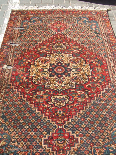 ANTIQUE BAKHTIARI fragment PERSIAN RUG CARPET Size: 190x120- cm / 74.8x47.2-inches, The rug has hole in some places(as you can see on the pictures)
Year: 1880-1900
Medium: wool on cotton hand made
   