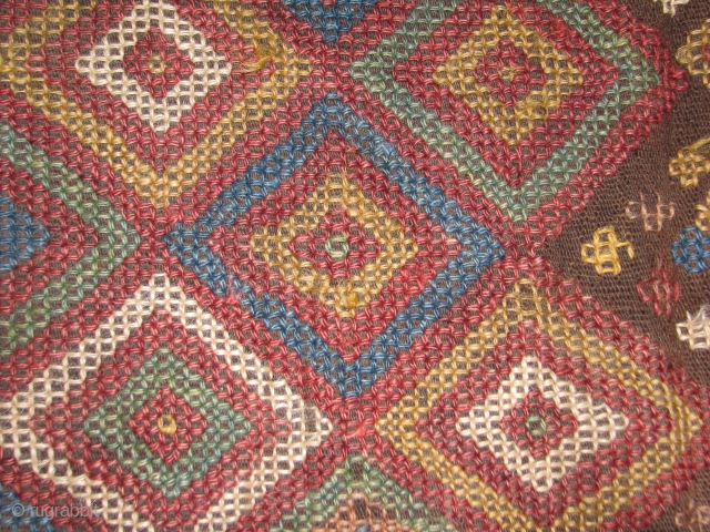 This is a flatweave fragment with all natural colors,as found. Some parts the worn out spots can be restored easily,restoration available on all kind of handmade rugs      