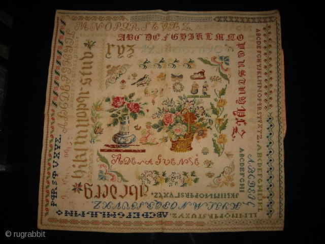 
    Late 1800's European embroidery silk on cotton. Alphabet sampler very good condition. About 16"x16".               