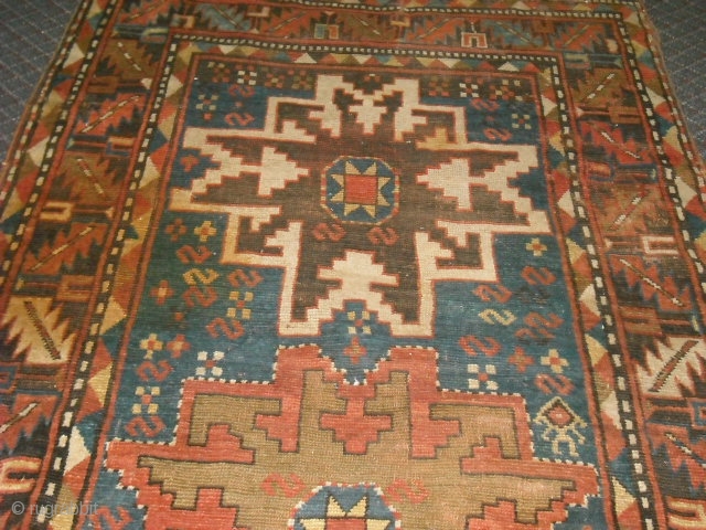 This rug is Persian rug or this is what I've been  told. (Perhaps more likely Caucasian?) It is old and has some conditions issues. It will have to be repaired. There  ...