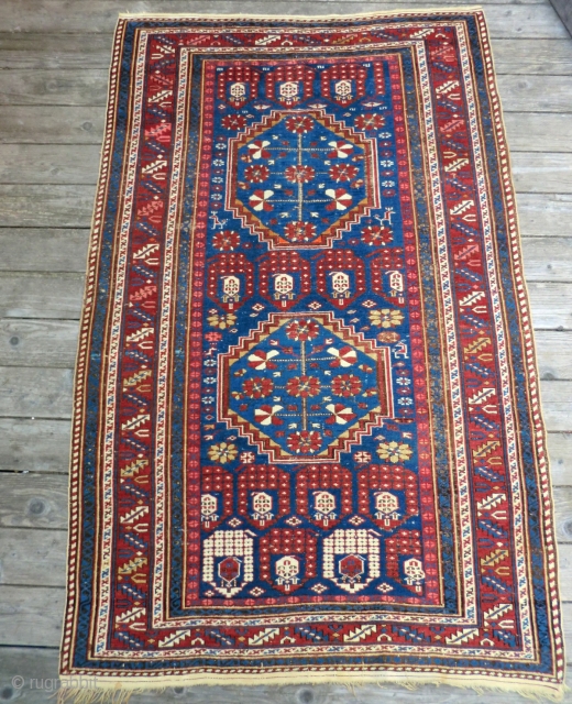 Antique Caucasian Shirvan Rug 4' x 7'
This rug is tightly woven and is in very good all original condition. It maintains guard borders on each end and is without repairs, tears or  ...