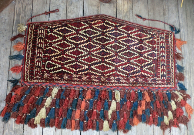 Antique Yomut Asmalyk -Large Size (124 cm by 64 cm[approx. 49" by 25"]-not counting tassels)
This five-sided Turkoman bridal trapping is truly a collector's item with real investment value. A rarity in the  ...