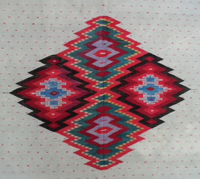 Antique Mexican Serape -Wool on Linen -74" by 38" This is a Saltillo style serape where the diamond center is an aggregate of four diamonds on a spot-repeat field with zigzag borders.
The  ...