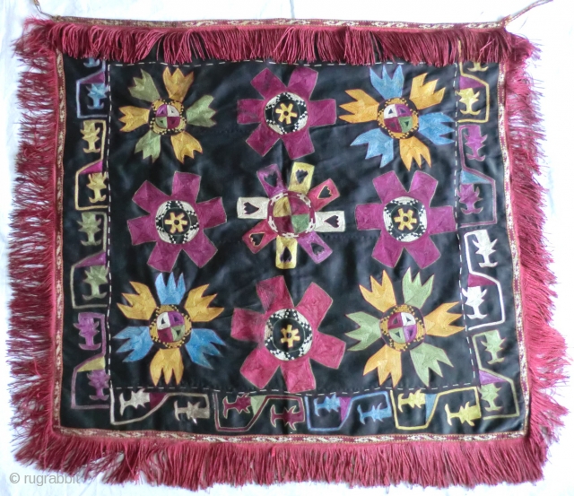 Antique Uzbek lakai Ilgitsh Embroidery -29" by 32" (Not Counting Fringe)
Blanket stitch and chain stitch silk embroidery on black cotton twill and twisted silk fringe with a silk ikat backing- all original  ...