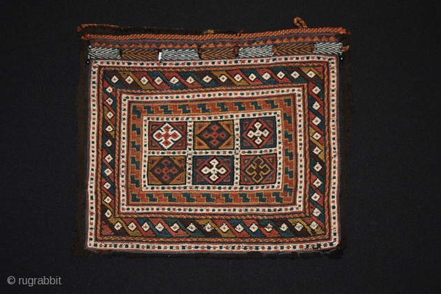 Afshari bag. 19th century.
Soumak and jijim on goat wool warp. White cotton.
Decorated back. Nice colors.
Holes on the back and corners. Good condition of the front.
Surprising soft and supple for goat hair.
Size :  ...
