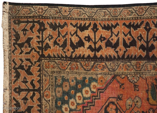 Antique Persian rug, 3x5.  Unusual border and human figures.  Several areas of dyed foundation from wear and oxidation.  http://www.dilmaghani.com           