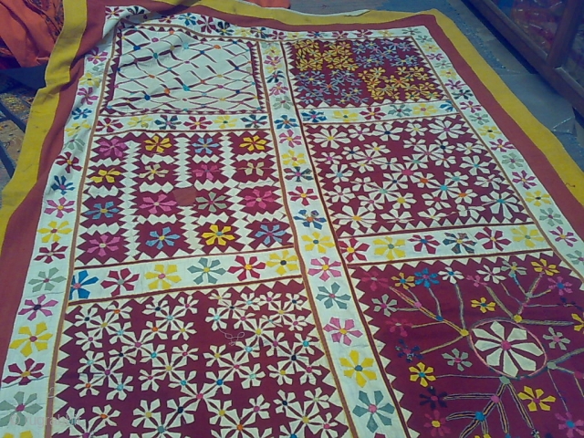 old hand quilted rug from village from jaisalmer in a good condition and nice colors combination hand applique work              