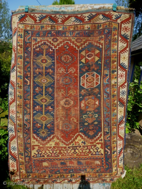 19th Century South West Anatolian Megri / Makri Rug 6' x 4' 6" or 185cm x 135cm.

Pure wool

Colours: Dark blue, light blue, aquamarine, canary yellow, mustard yellow, ivory, aubergine, black, red.

Damaged and  ...