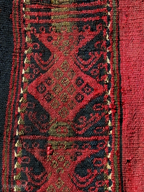 A pre-Columbian coca bag: camelid wool: Vicuña. With wear and losses in places. Possibly over 500 years old. From the Andes mountains: Peru. Bolivia. Size: 40 x 30 cm, excluding tassels. Damage  ...