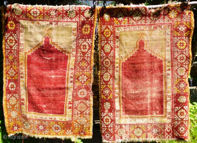 Pair of Antique Turkish Oushak prayer rugs. Distressed condition, dirty and holed in places - see photos. Outer borders missing each end. Selvedges damaged. Foundation showing in places. One tatty corner

Can be  ...