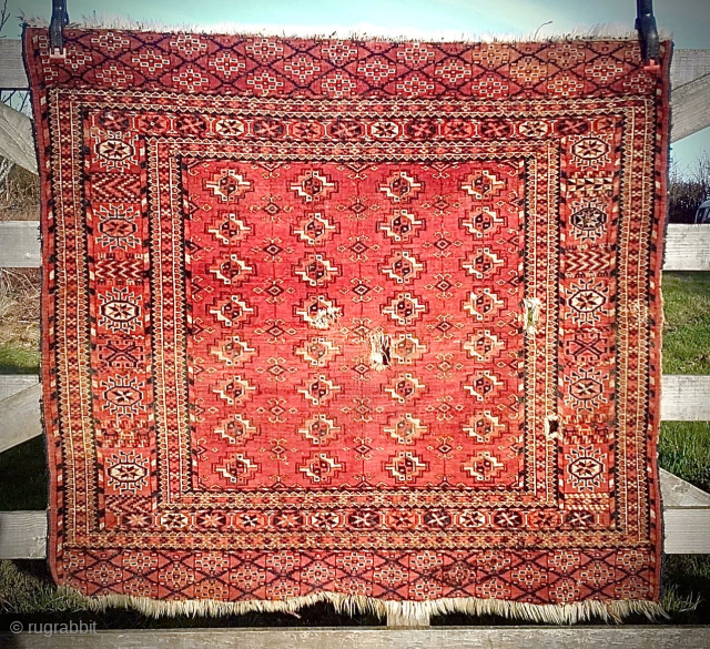 Tekke Turkmen Wedding Rug. 19th Century. Natural colours. Small format: 125cm x 110 4ft x 3ft 6in. Four small holes, one darned area. Soft lustrous pile. Lovely details in border   