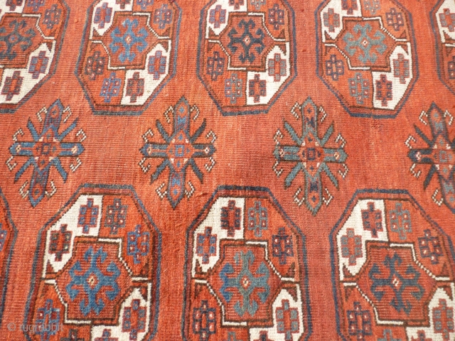 Good antique Turkmen main carpet. Ersari field motifs. Colours: raspberry red abrashed main field ( not clearly represented by all featured photos ), light blue, dark blue, sea green, yellow, white, brown,  ...