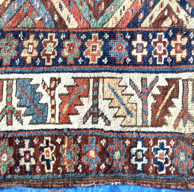 Luscious 19th century Tribal Persian long rug or carpet. Kurdish? Pure wool, vegetal colours. In so called ‘country house’ condition (meaning uneven wear, sides and ends tatty in places - see photos).  ...