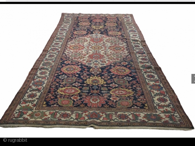 North West Persian ‘harshang’ Gallery Carpet, Wool on Cotton warps and dark brown wool foundation. 19th Century. Size: 6'8" x 17' approx. One tear on edge. Pile low in places. Carpet has ...
