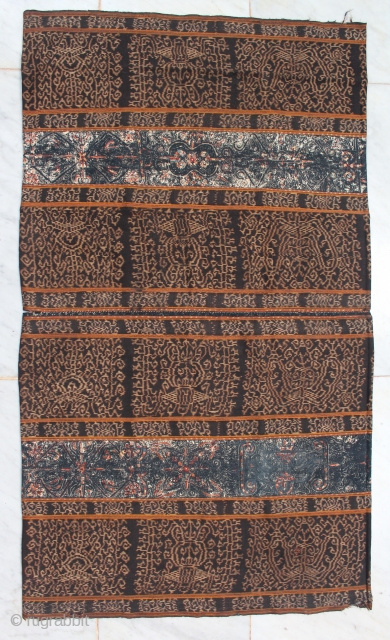 A Rare Sarong Tapis Inuh from lampung Sumatera Indonesia. Very fine ikat with two panel embroidery vajra motive. 70cm X 120cm. 18th-19th century.          