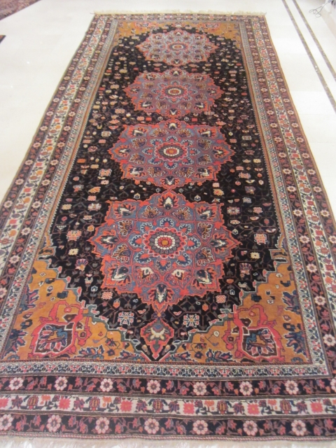 Rug no:	16
size	:	486 x 220
type:	Antique 1880
origin:	Iran
design:	Qashqai
content	:	Wool on wool


the medallions here appear to have been adopted from a city rug,but the less sophisticated field design gives this unusual piece a particular charm.this is the  ...