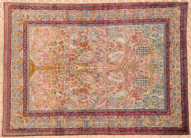 RUG NO : 54 
 
SIZE : 404 x 277 
 
TYPE : Antique 1880 
 
ORIGIN : Iran Lavar 
 
DESIGN : Tree of Life 
 
CONTENT : Wool 
 
BACKGROUND  ...