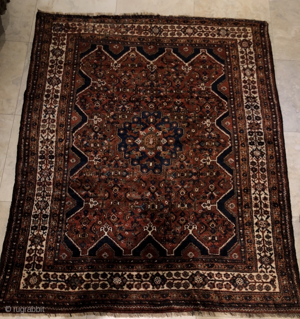 Almost squarish Maharlu/khamseh rug .

silky wool and excellent condition.washed and waiting for a nice home  to be enjoyed .

215X176 cm .

available in London         
