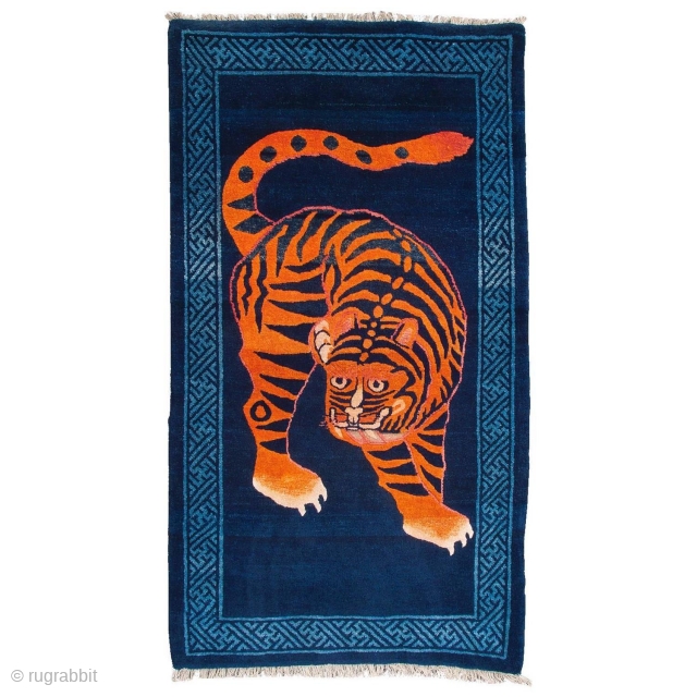 Period: 1920

Set against a dark indigo background, this tiger stands to attract attention. This powerful tiger is just turning around, ready to scare of any evil whilst maintaining a friendly attitude towards  ...