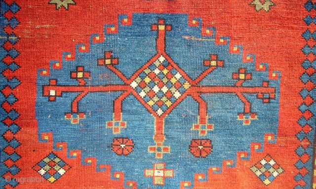 Antique Kazak rug. Circa 1900.175cm x 114cm.All good dyes.Small hole to fiels and some wear.                  