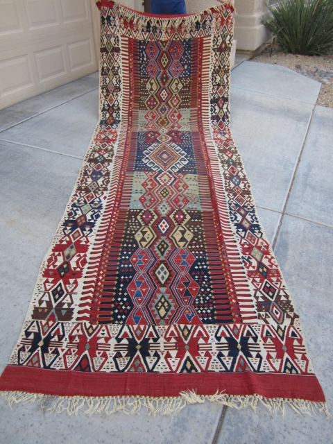 19th Century Kagizman (Kars) Anatolian, Turkish utilitarian kilim.
All natural vegetable and root dye derivatives... an array of very nice organic colors and balance. Some expert-masterfully performed repairs. 
Size: 149 inches long x  ...