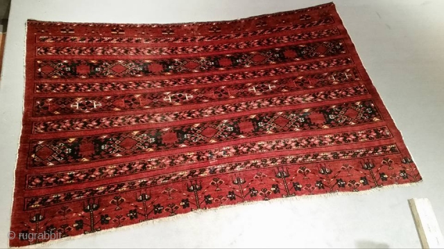 A very unusual size cm 180x125 about 6"x4" Ersari chuval with soft shiny wool. Some worn areas and a little repair. wool and cotton foundation. Age 1880 ca.
     
