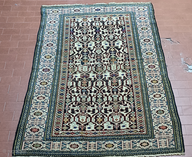 Nice Konaghend Kuba with great main kufic border on light green background. 

Worn in the field with a repiled area. size cm 150x110 ca.

for other images please ask     