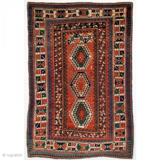 Antique Kazak with beautiful colors. Soft, clean and in very good condition. 232 x 154 (7.7" x 5")               