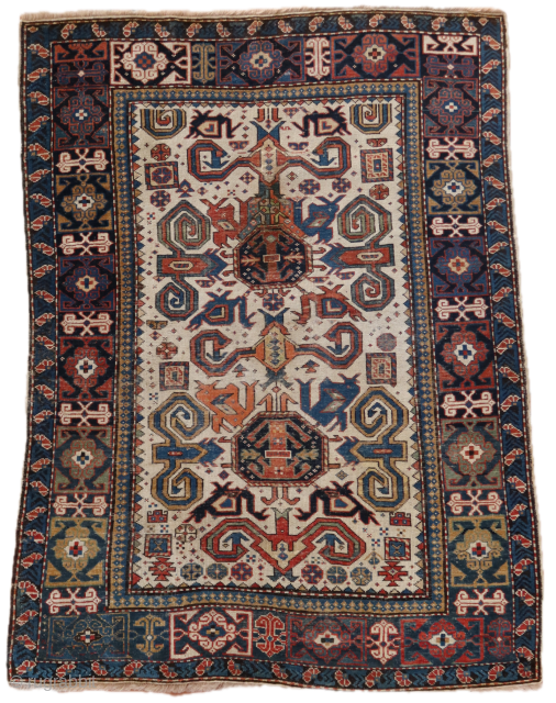 Rare Ivory field Perpedil rug XIX Century (1880 ca)

Old repairs but still a great power in it. 

Stunning Kufic border 

cm 156x118

Other HQ pics on request       