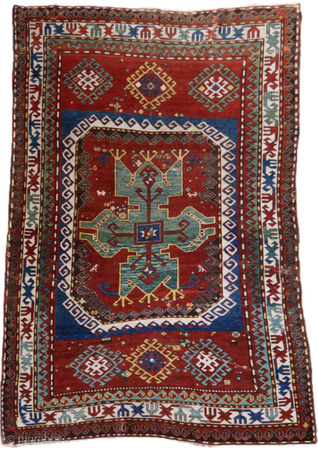 Antique Kazak Lori Pampaq, second half XIX century (1860/1880 in my opinion)
Cm 265x174
Old repairs, especially on dark colors (brown/black), corrosion, a small wave in the field (see 2nd picture), needs to fix ...