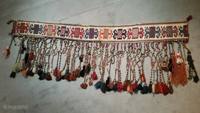 Shahsaven Spoonbag side band fragment (qashoqdan fragment)South caucasian Area. Very Decorative to hang. 
Some tassels are from later period, mostly are original. end 19th century. size aprox cm 150 x 14 without  ...