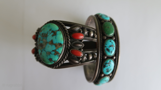 Native american objects ( 2x ) Navajo Silver wrist bracelets. With stones.  Bought at a furrier at Dumbo. New York. Years ago.

Listening ; Howie B / Robbie Robertson  ; Take  ...