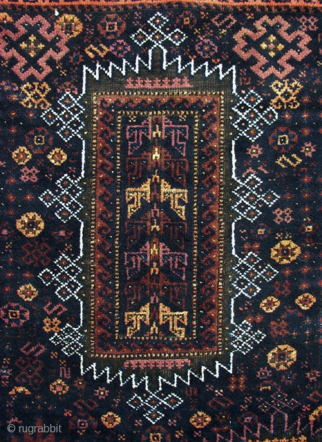 Timuri Baluch ( Khorassan ? ) ca.1920. Wool on wool. ca. 330 cm. x 160 cm. Good overall condition . Great dark blues, madder ,some peach and some yellow highlights. Some oxidation  ...