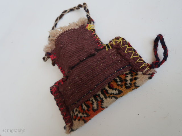 Trans Caucasian ( ? ) small fragmented bag .  Ca: 20 cm . x 23 cm. Thick piled, soft, colors.            