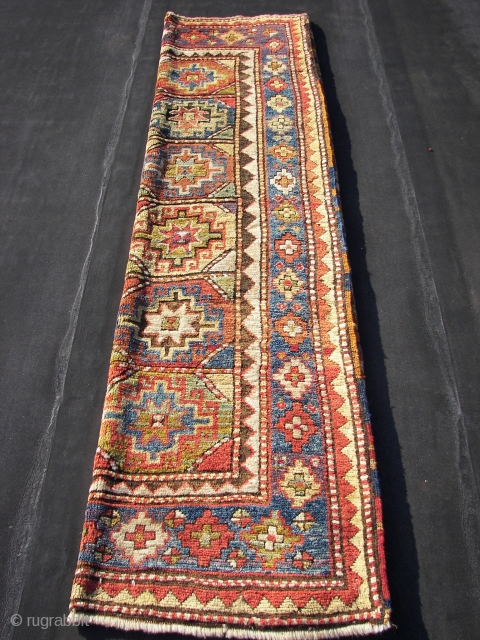 Longhaired Caucasian,with a three row selvage. Moghan ? Kazak ? Wool on wool. Old, ca:1920. ca. 240 cm. x 145 cm. Bird/animal motifs and Memling guls on the inner field. Thick ,lush  ...