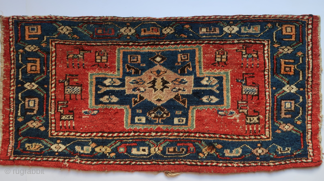 Rare Afshar/ Azeri single Bag Panel khorjin. With a silk strip on the backside added.( Fragmented.) Origin; Bought on the internet years and years ago . 110 cm. x 51 cm. ...