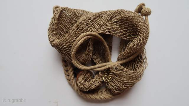Edwardian era. Knotted string hunting bag. ( Kif-e Shekaar.) string, metal,copper,maluswood. Ca; 80 cm. (ca; 31 inch.)( four to five rabbits/ 3 pheasants) No restorations.
Contact and info ...