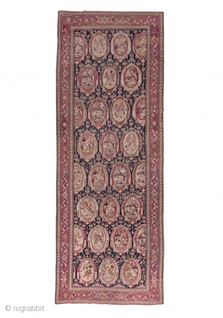 Karabagh Gallery Carpet

7.1 x 19.2
2.16 x 5.85

This south Caucasian carpet is in the Russian style with columns of elliptical "mirrors" displaying European-style floral bouquets on a contrasting black ground. The cochineal scarlet  ...