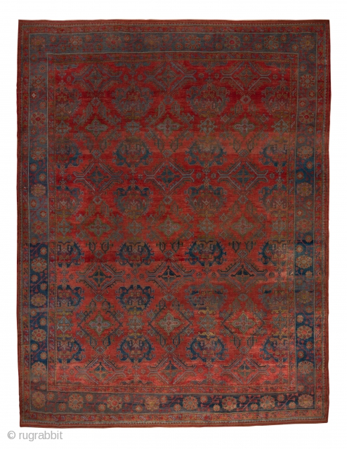 Oushak Carpet

14.0 x 18.2
4.26 x 5.54

The  abrashed soft madder red field of this western Turkish workshop carpet displays an allover yaprak ("leaf") pattern mixing  ragged palmettes and broken, hooked lozenges  ...