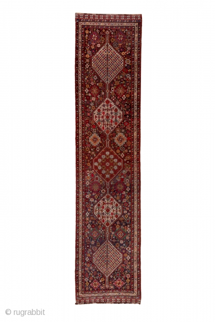 Khamseh Runner

3.6 x 15.2
1.09 x 4.63 
The medium blue field of this south Persian tribal runner displays a pole medallion of four ivory and one red hexagons with colourful small and medium  ...