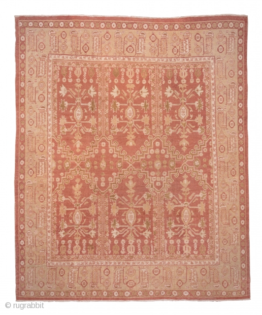 Oushak Carpet

11.10 x 14.6
3.38 x 4.45

This boldly drawn workshop carpet  shows a soft coral field with two strongly hooked side-by-side stepped cartouches , each on a vertical pole, with vases sprouting  ...