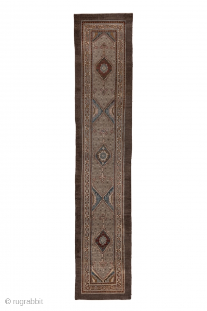 Hamadan Runner

3.5 x 17.0
1.06 x 5.18
 
With a wide dark camel-tone plain outer border, this characteristic west Persian village runner displays three ragged palmettes, each set within and ivory and  camel  ...